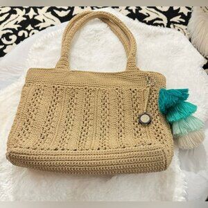 The SAK Crocheted Bamboo Gold Purse Shoulder Bag Hobo Handbag Tote Tassel Charm